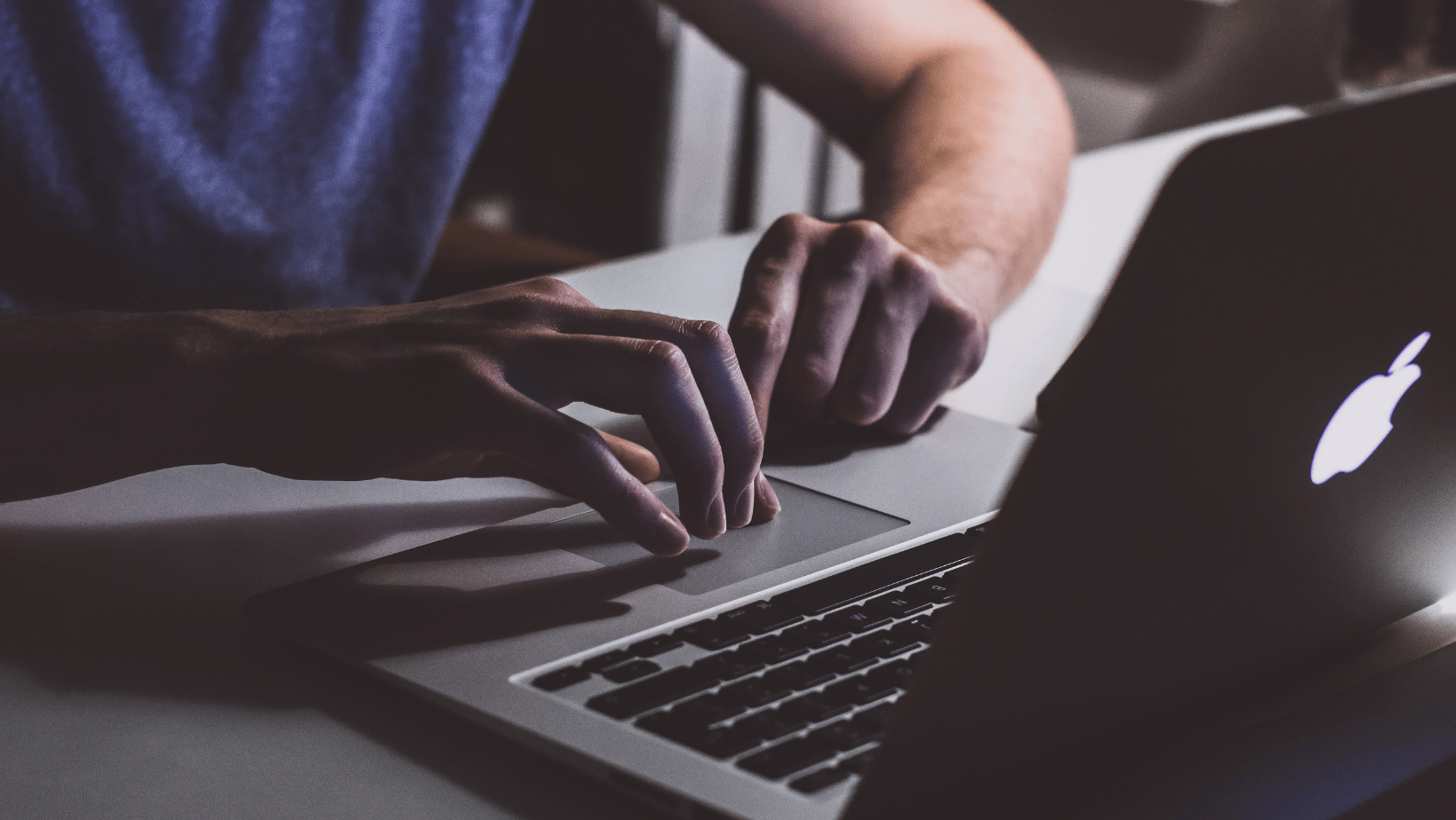 a person using a laptop browsing the internet with Fibre plan in Cape Town 